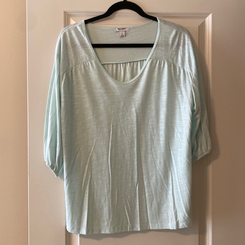 Light blue top